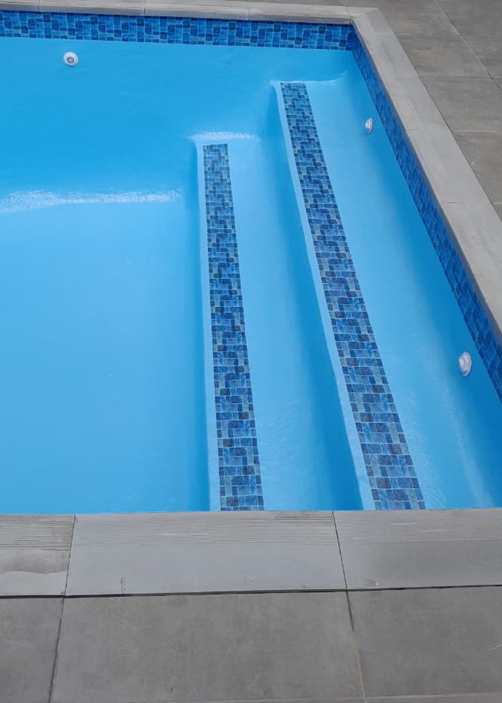 Skynet technician diagnosing pool suction problems at a Pretoria home